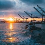 panoramic shot oil rigs sea with beautiful sunset
